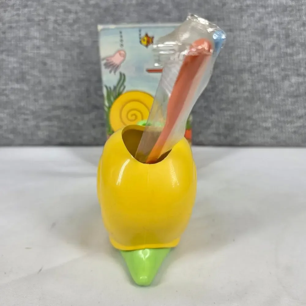 VINTAGE Avon Yellow and Green Smiley Snail Toothbrush Holder